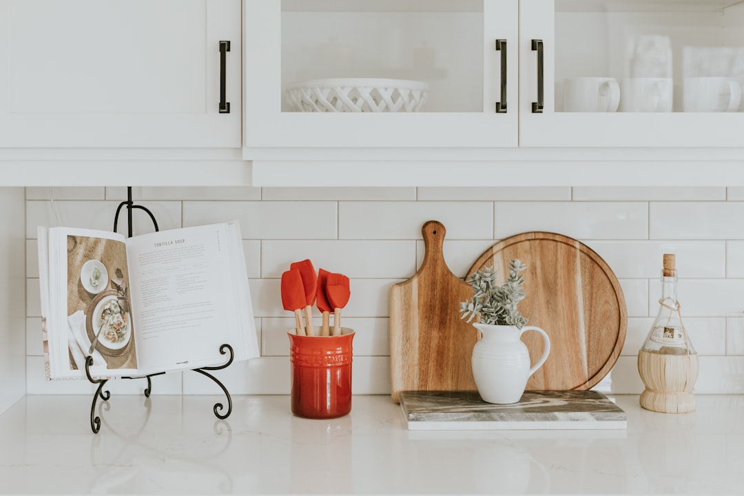 A well-organized kitchen with essential cooking tools and appliances, showcasing a clean and efficient workspace.
